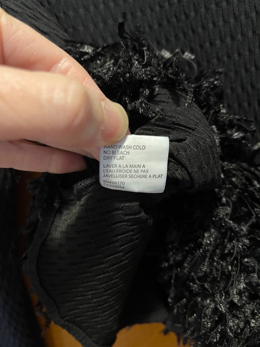 Anthropologie Black Long-Sleeve Cropped Top with Feathered Hem - Picture 8 of 8
